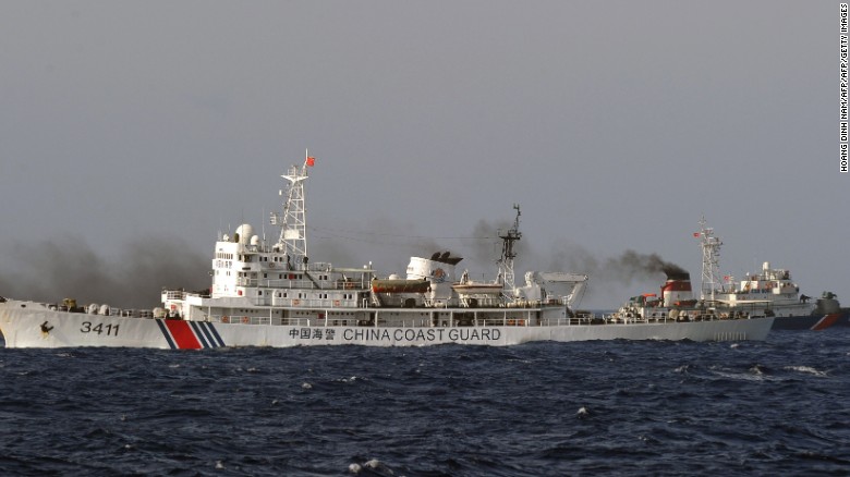 Chinese ship forces US destroyer off course
