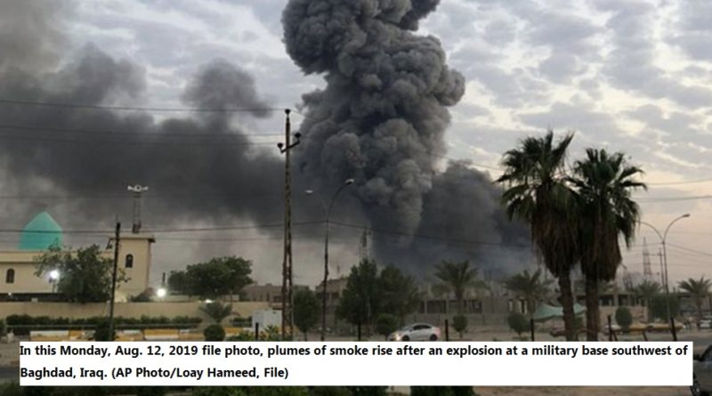 Plumes of smoke rise after an explosion at a military base southwest of Baghdad Iraq